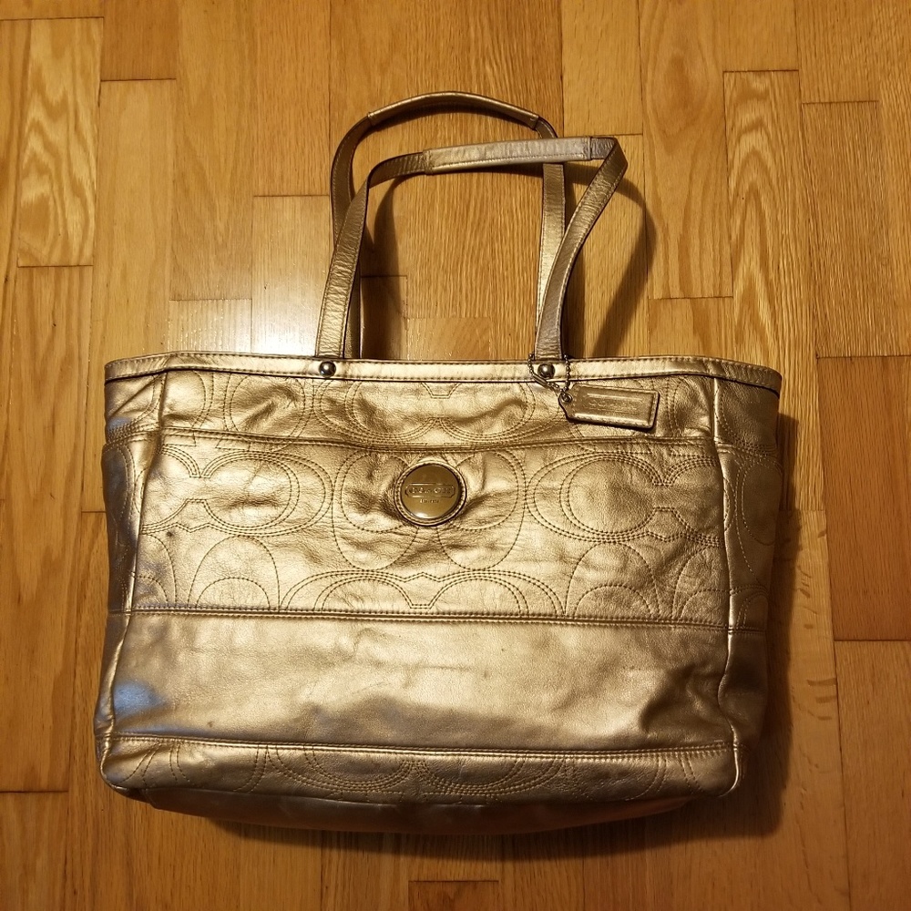 Coach Gold Monogrammed Leather Baby Bag